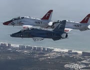 Three U.S. Navy T-45s flying