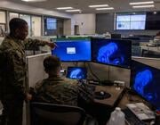 Marines working at operations center.