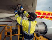 DHL Express aircraft and employee
