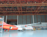 a Firefly aicraft in a hangar