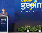 executive speaking at symposium