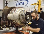 aircraft technician working on hardware