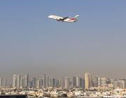emirates jet flying above uae