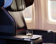 Delta Premium seating with a wine glass