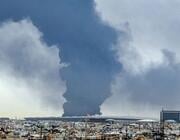 Smoke billows following a strike at a fuel depot at Kuwait International Airport in Farwaniya Governorate, Kuwait, March 25, 2026