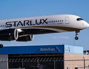 Starlux A350 over American hangar