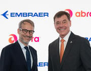 Abra and Embraer execs