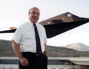 Denys Overholser in front of F-117