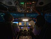 pilots in cockpit