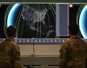 Space Defense Squadron members operate the ATLAS system 