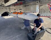 Underwing munition loading