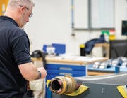 person working on fan blade