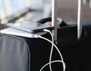 portable charger on suitcase