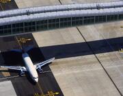 aircraft passing under bridge at london gatwick airport