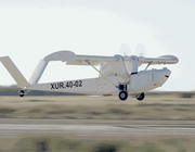 FlyOx 1 amphibious aircraft taking off