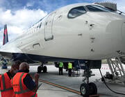 Delta Air Lines Airbus A220 parked on the tarmac during ground operations