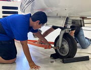 high school student working at obtaining an FAA mechanic license with Choose Aerospace