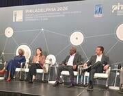 panelists on stage at the aci-ni in philadelphia