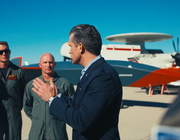 Defense Secretary Pete Hegseth speaks in front of a Boeing MQ-28 at NAS Point Mugu, California, in December 2025.