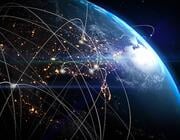 earth from space at night with sweeping network lines