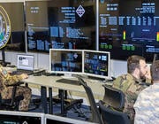 Soldiers at computers at NATO Space Operations Center