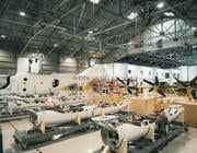 large G-EVTA aircraft sits in an industrial hangar