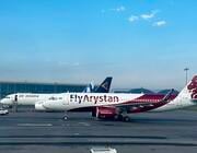 air astana and FlyArystan aircraft on an airport tarmac
