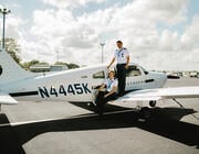 Skyborne Airline Academy Piper training aircraft with flight trainees