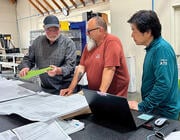 ATS staff viewing 350 FAA-approved parts