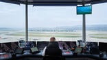 Air traffic controller viewing runways
