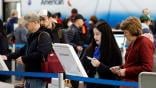 travelers checking in for an American Airlines flight