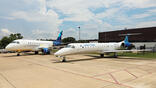 One CommuteAir and one United Express Embraer jet
